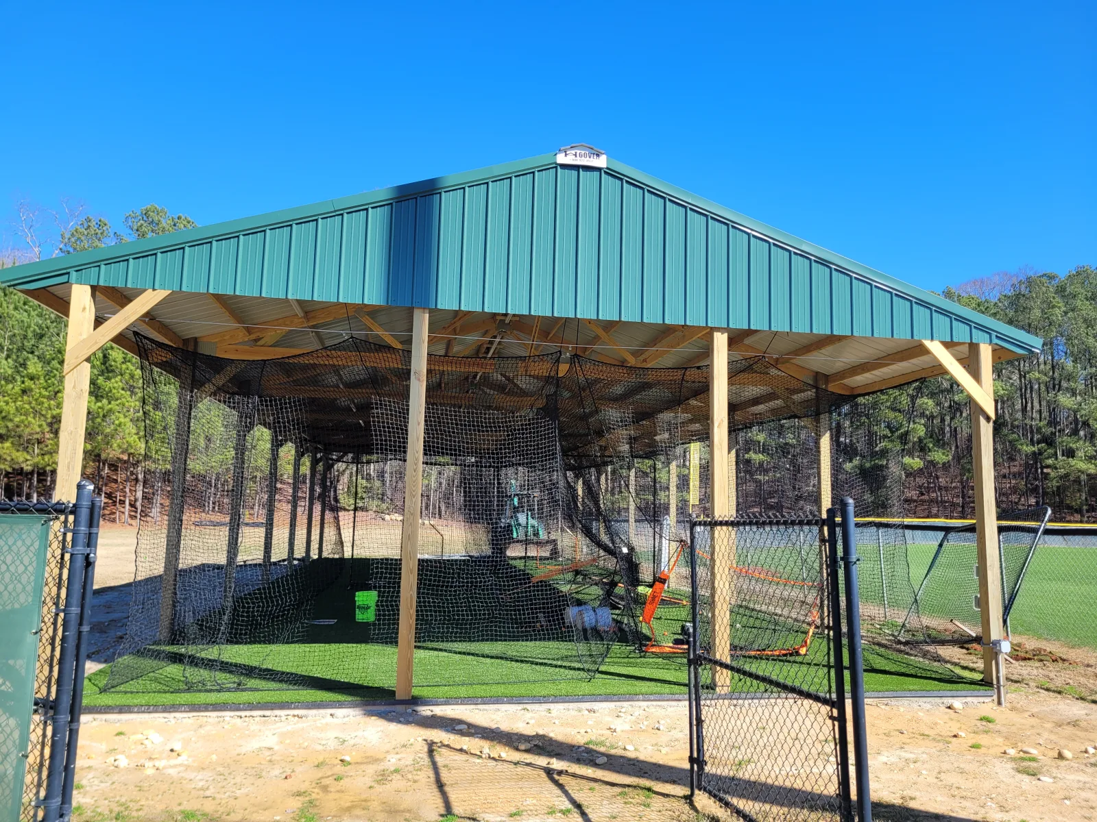 Specialty softball batting cage building built for a South Carolina high school