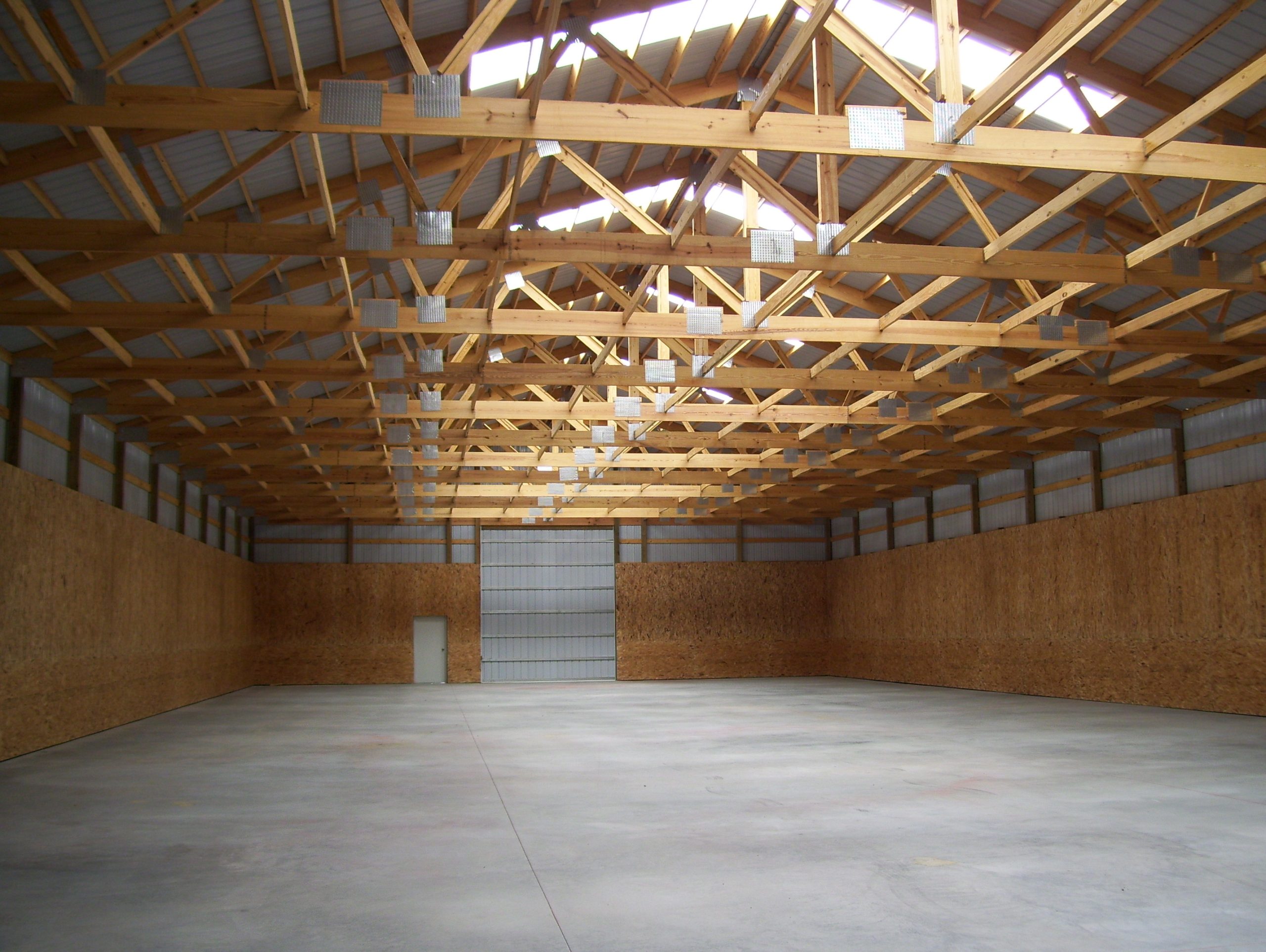 Interior view of engineered roof trusses manufactured in-house at Hoover Buildings