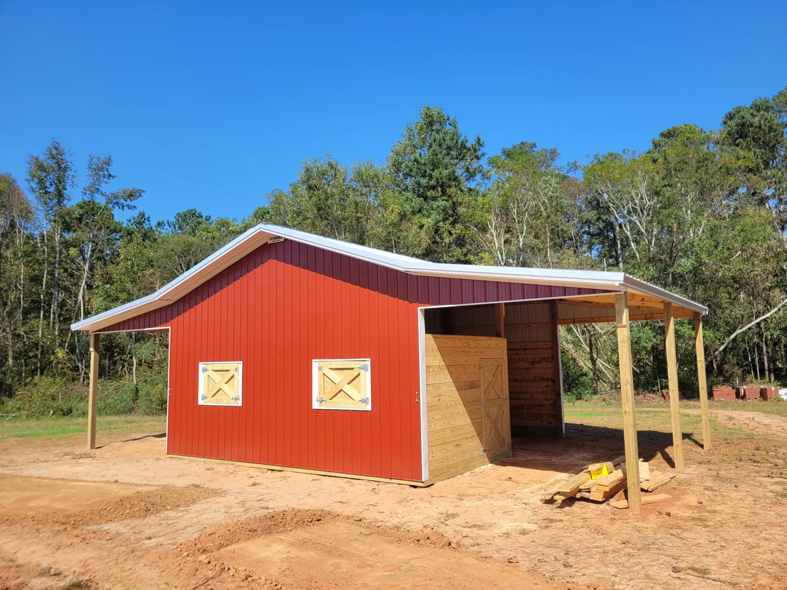 Mini horse barn with two lean-tos, built by Hoover Building Systems
